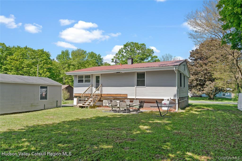 69 Mossybrook Road High Falls, NY 12440 - Photo 26 of 36 a view of a house with a yard and sitting area