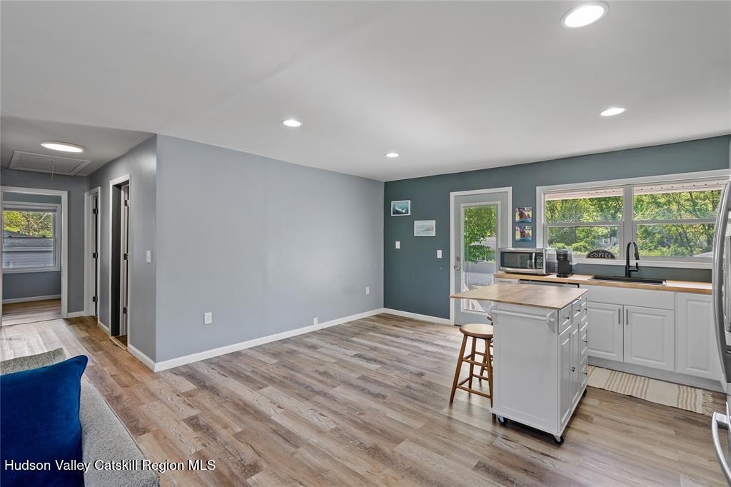 69 Mossybrook Road High Falls, NY 12440 - Photo 4 of 36 a open kitchen with wooden floor and outdoor space
