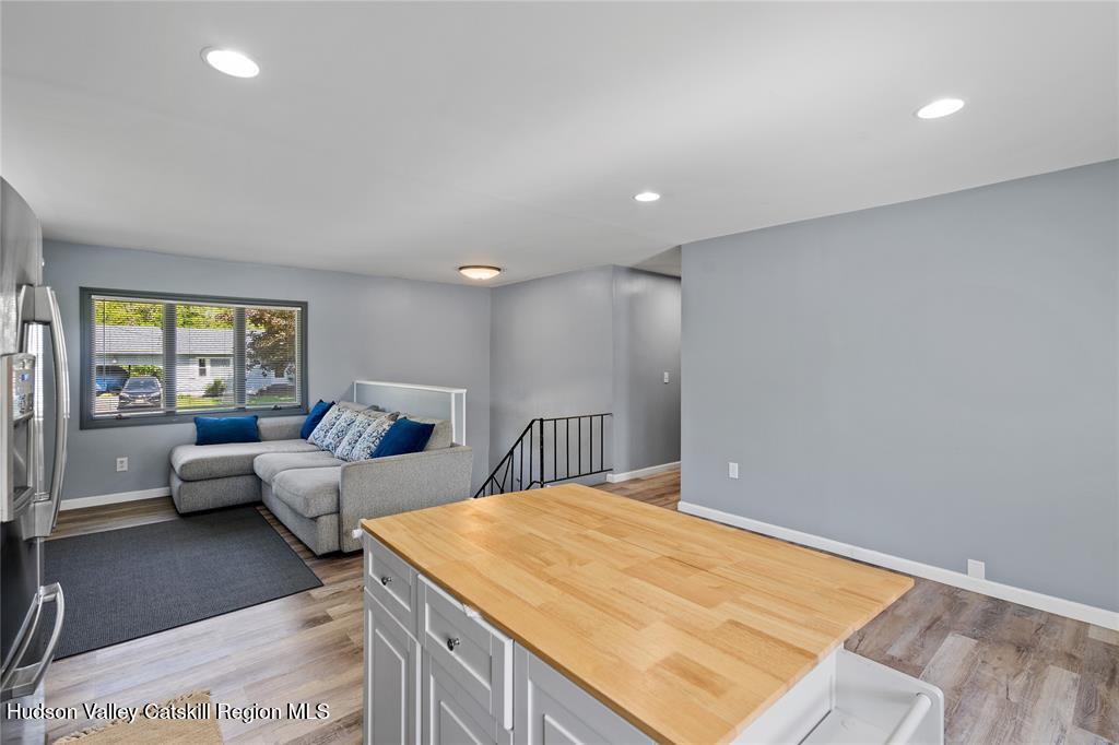 69 Mossybrook Road High Falls, NY 12440 - Photo 6 of 36 a living room with a couch and a large window