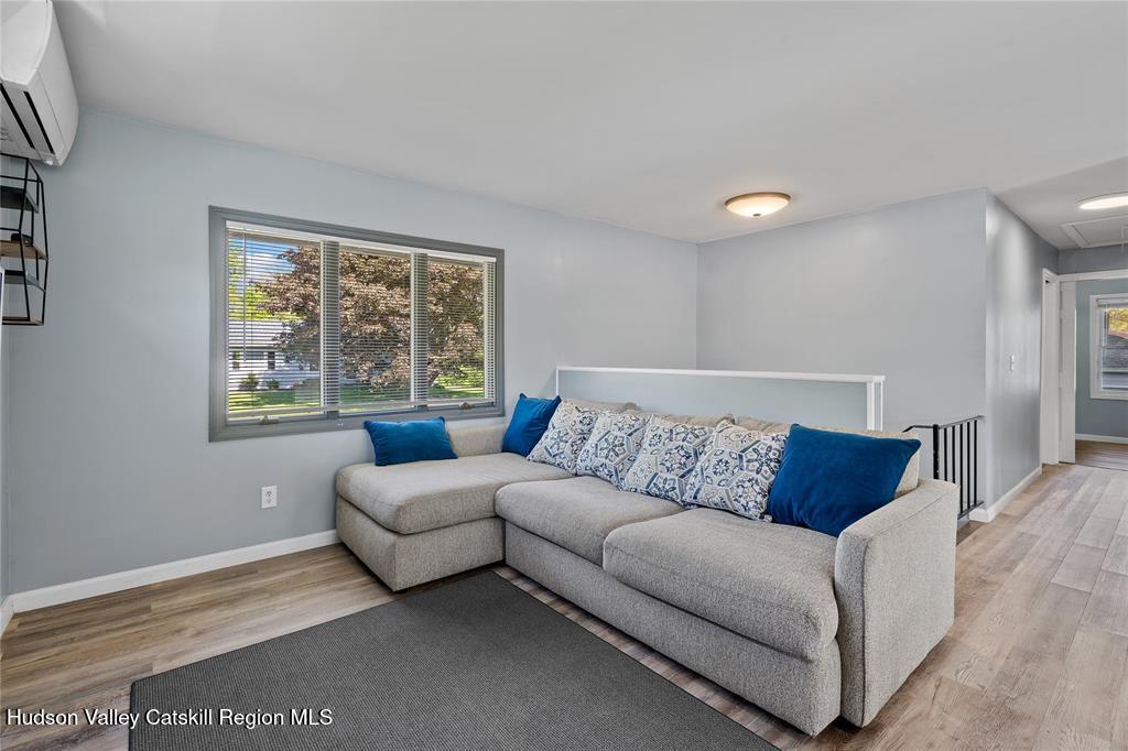 69 Mossybrook Road High Falls, NY 12440 - Photo 10 of 36 a living room with furniture and a window