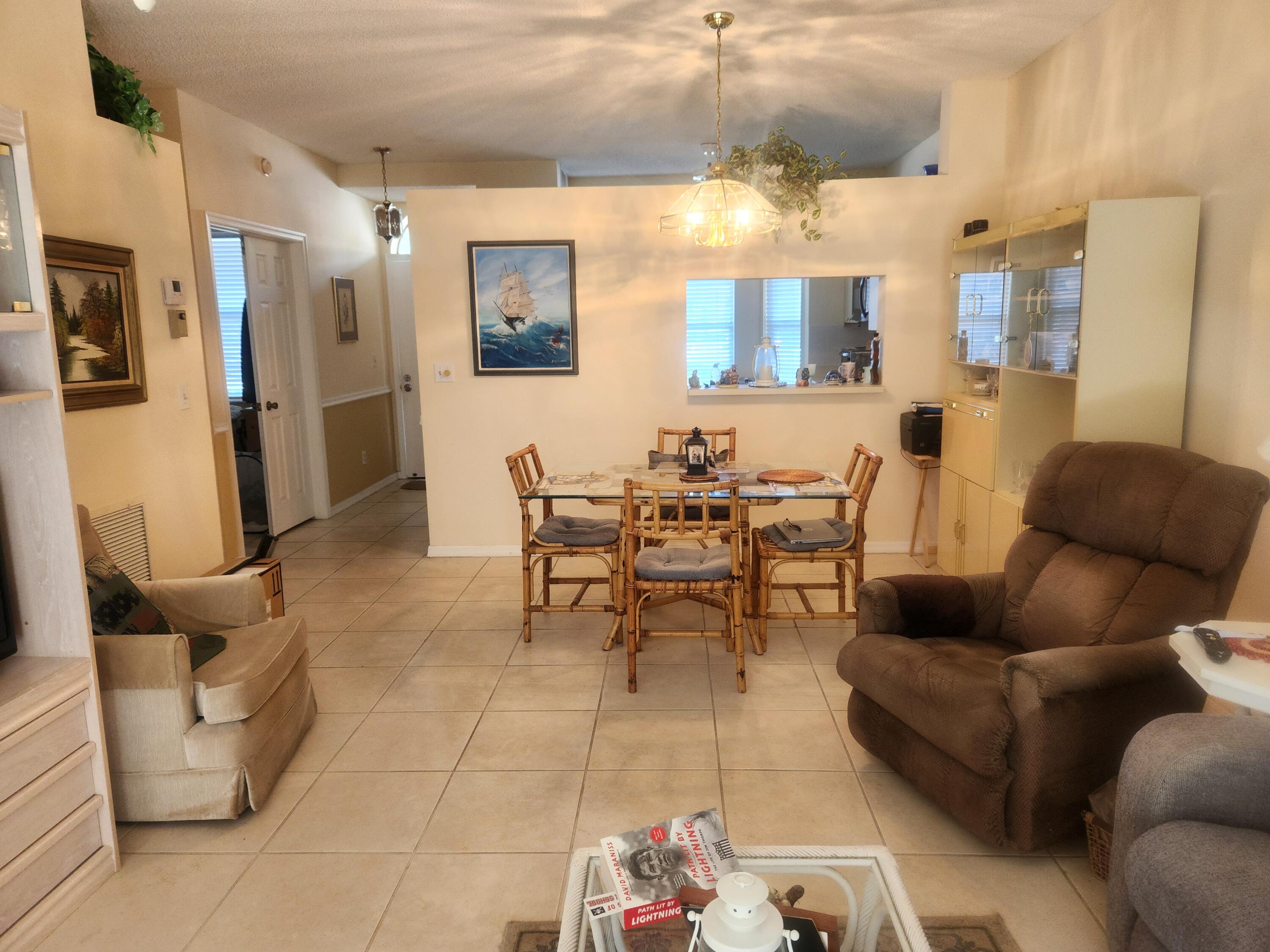 18081 Southeast Country Club Drive, Unit 37363 Jupiter, FL 33469 - Photo 6 of 20 Little Club #363 Living Dining