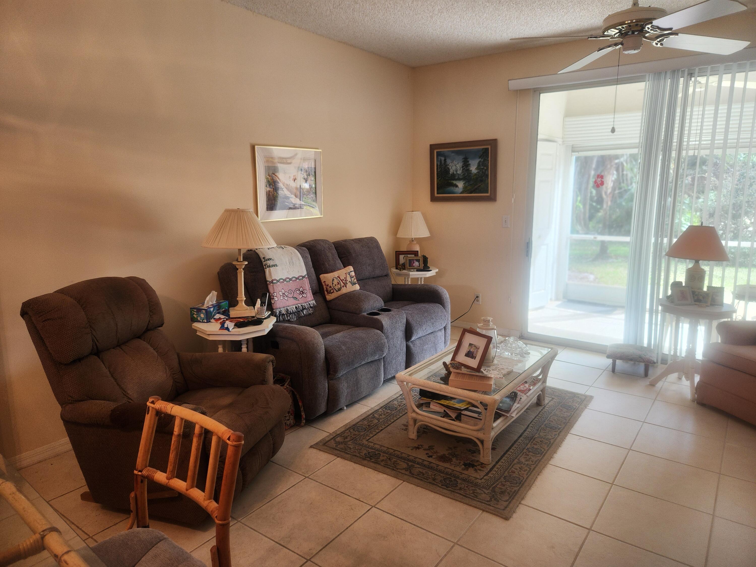 18081 Southeast Country Club Drive, Unit 37363 Jupiter, FL 33469 - Photo 7 of 20 Little Club #363 Living Room 2