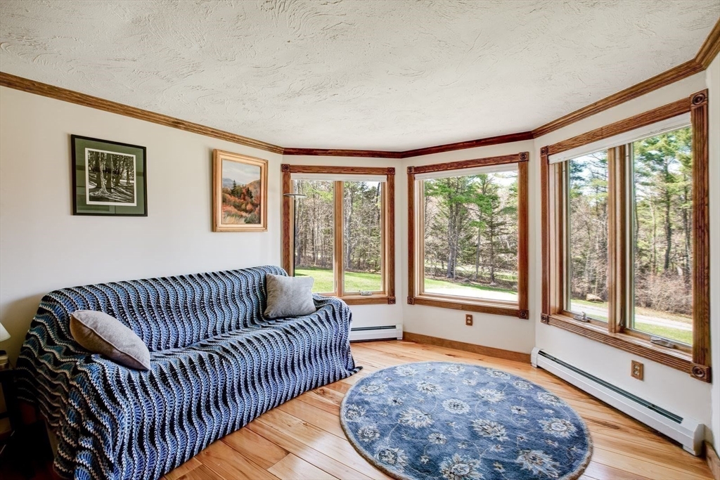 205 East Rindge Road Ashburnham, MA 01430 - Photo 30 of 40 a living room with furniture and a rug
