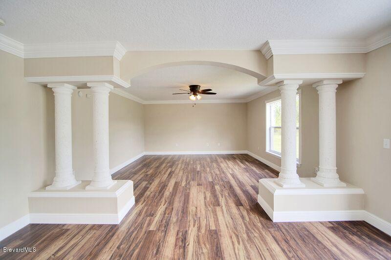 2139 Watkins Road Southeast Palm Bay, FL 32909 - Photo 12 of 32 a view of entryway with wooden floor