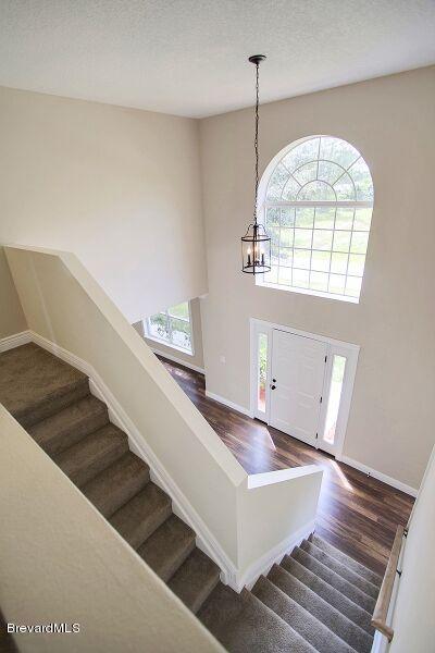 2139 Watkins Road Southeast Palm Bay, FL 32909 - Photo 27 of 32 a view of an entryway with wooden floor