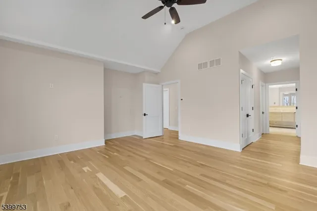 a white bath tub sitting next to a window
