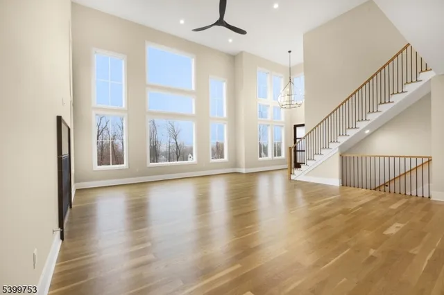 a view of an entryway with wooden floor