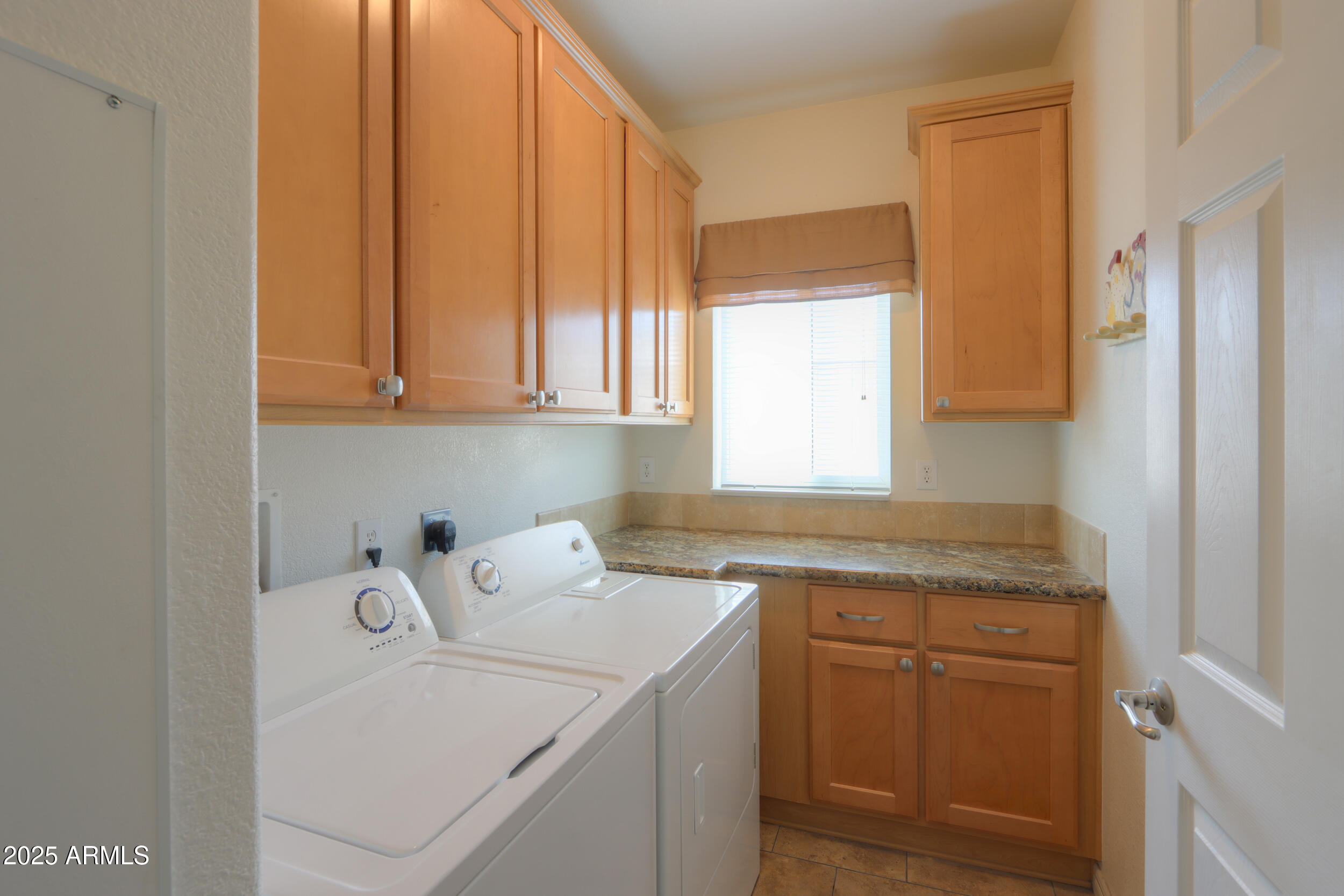 2263 North Trekell Road, Unit 36 Casa Grande, AZ 85122 - Photo 20 of 53 a utility room with a sink washer and dryer