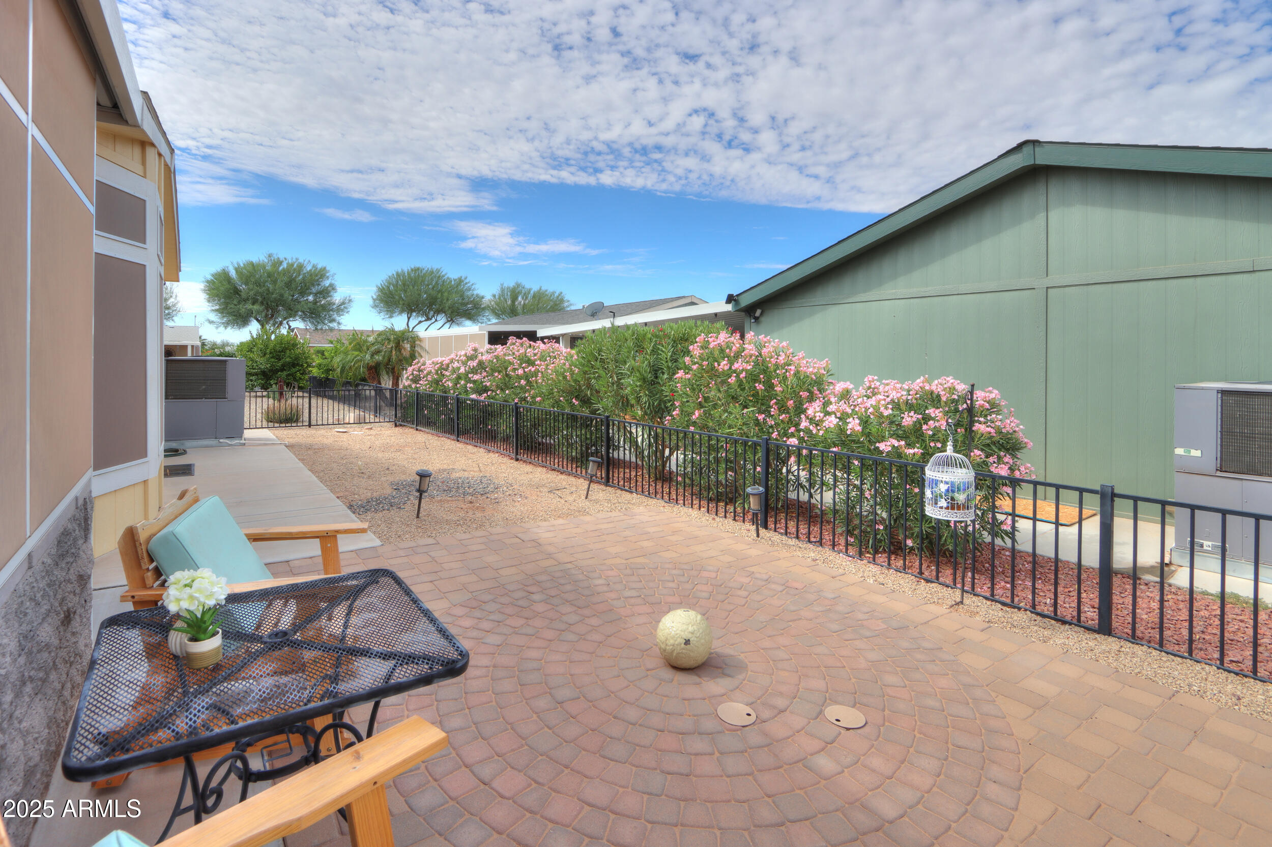 2263 North Trekell Road, Unit 36 Casa Grande, AZ 85122 - Photo 30 of 53 a view of a backyard with sitting area