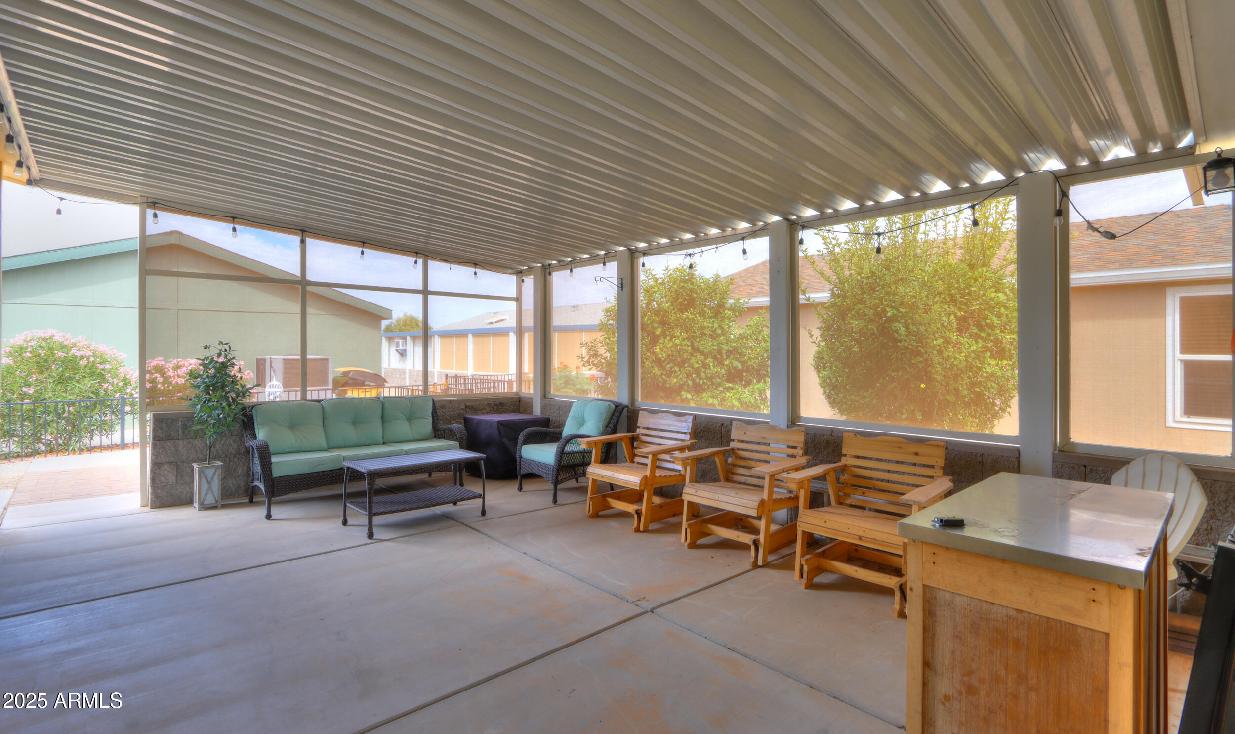 2263 North Trekell Road, Unit 36 Casa Grande, AZ 85122 - Photo 31 of 53 a building outdoor space with patio furniture and potted plants