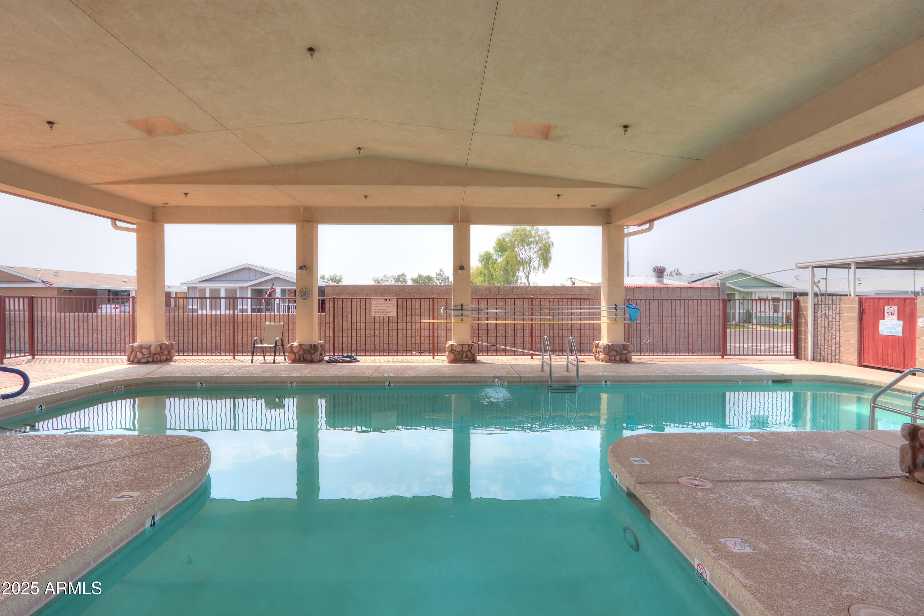 2263 North Trekell Road, Unit 36 Casa Grande, AZ 85122 - Photo 36 of 53 a view of a kitchen with a sink and a garden
