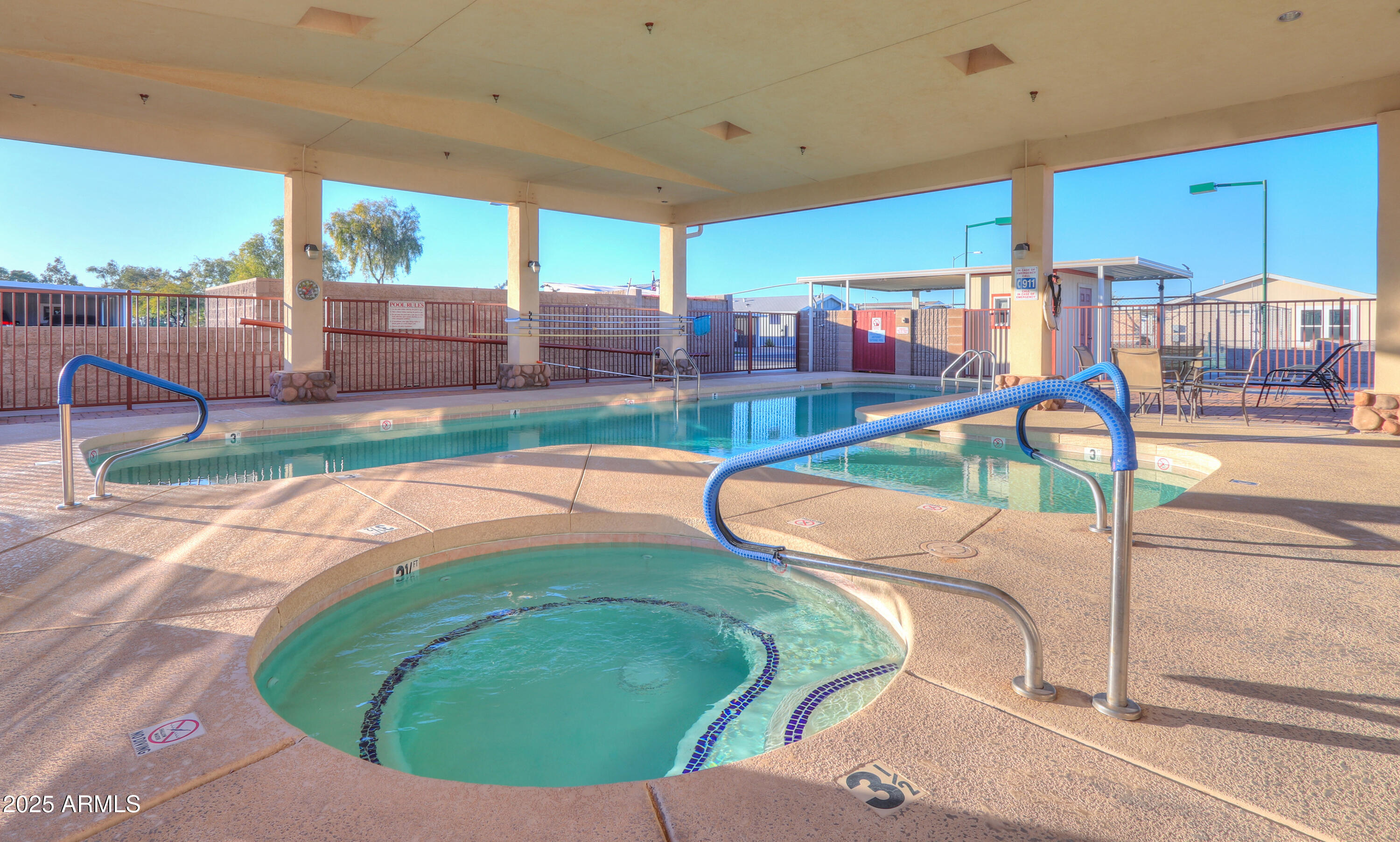 2263 North Trekell Road, Unit 36 Casa Grande, AZ 85122 - Photo 37 of 53 a room with lots of windows and couches