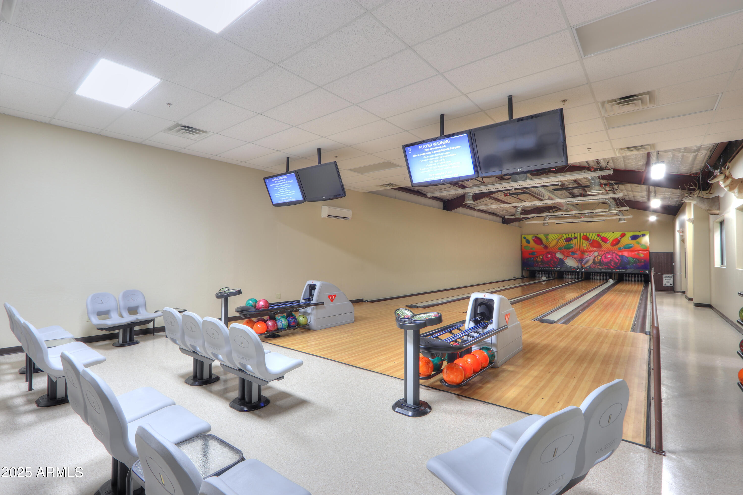 2263 North Trekell Road, Unit 36 Casa Grande, AZ 85122 - Photo 44 of 53 a bedroom with furniture and a flat screen tv