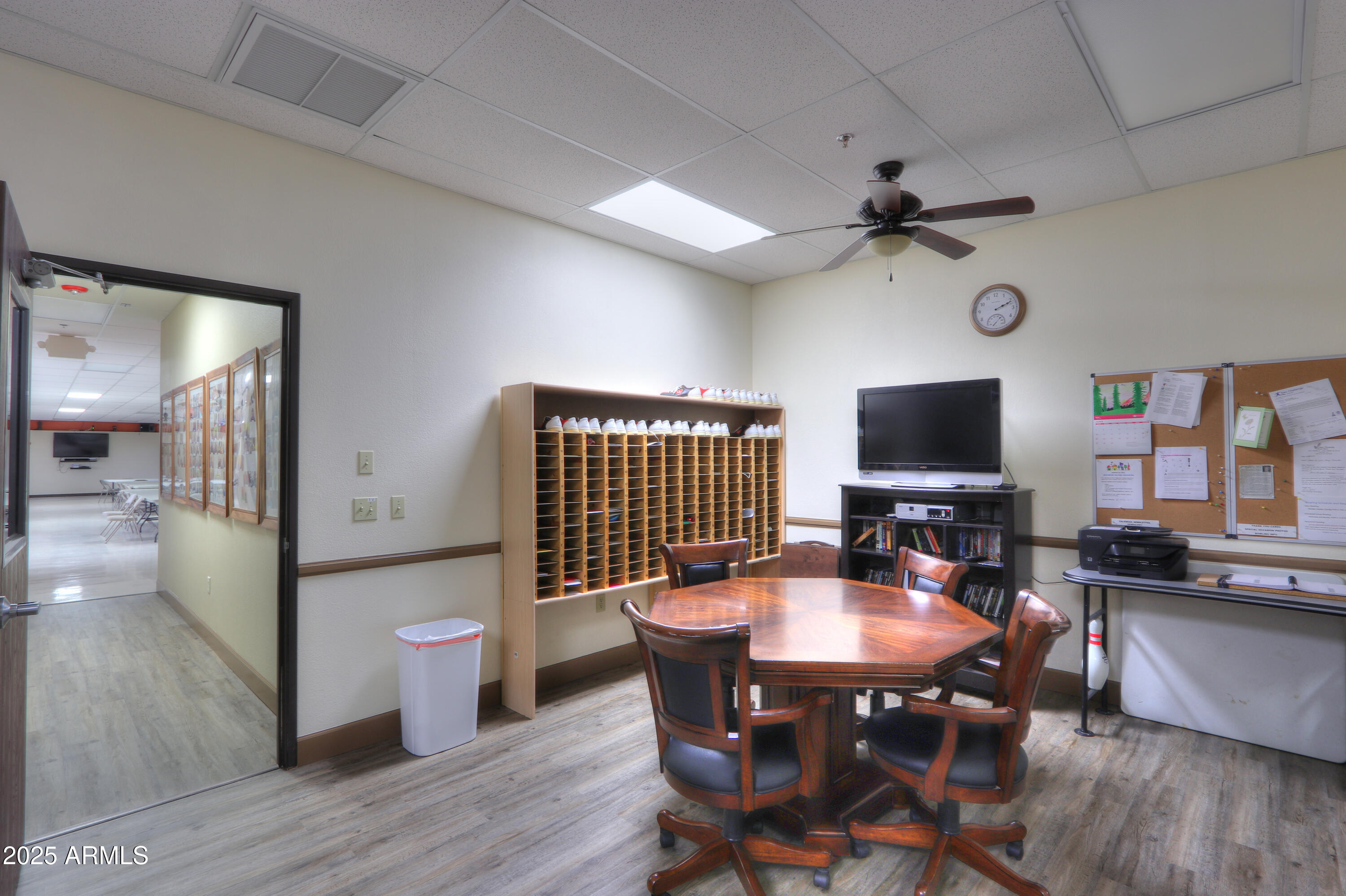 2263 North Trekell Road, Unit 36 Casa Grande, AZ 85122 - Photo 47 of 53 a view of a dining room with furniture and wooden floor
