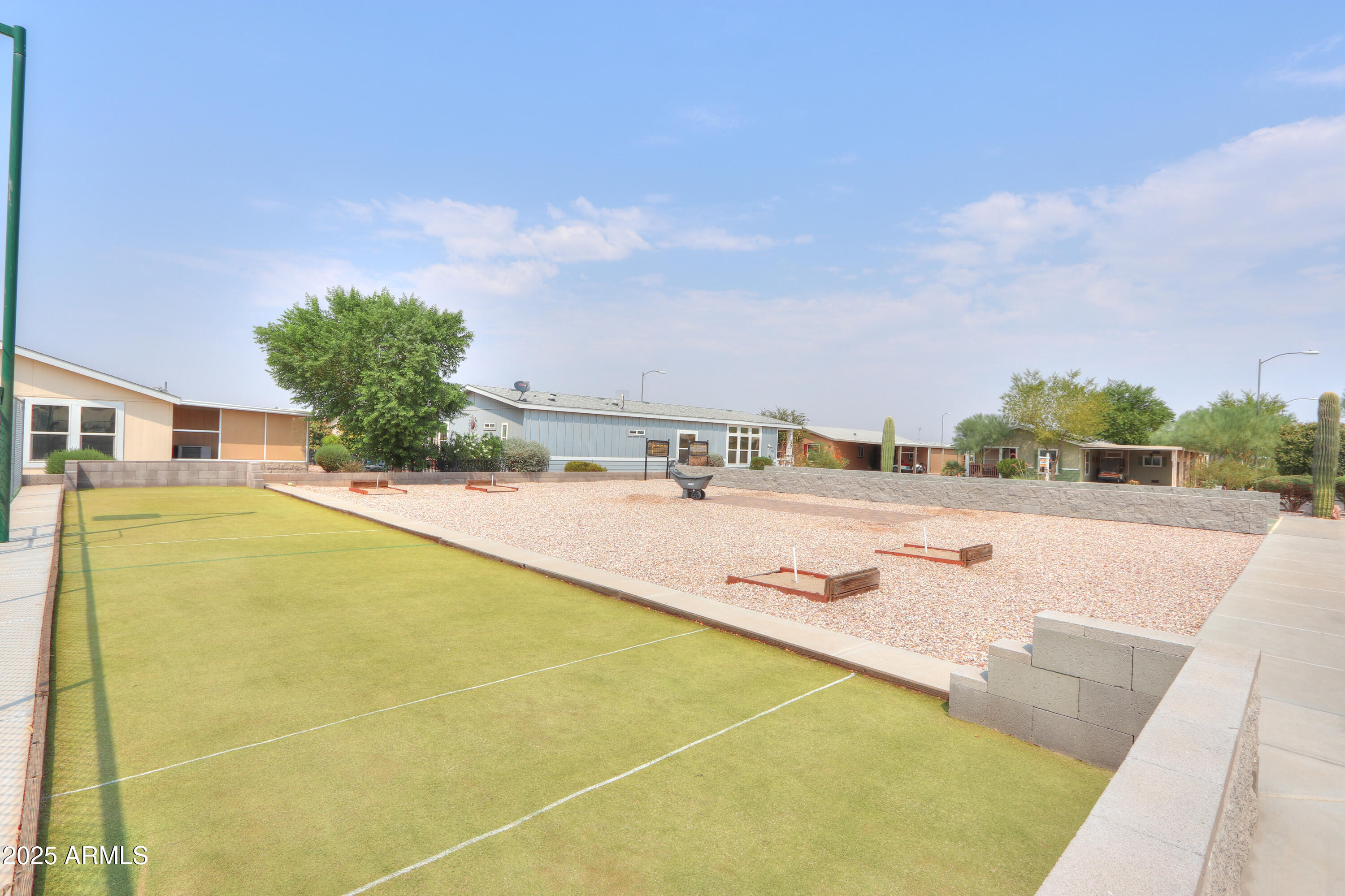 2263 North Trekell Road, Unit 36 Casa Grande, AZ 85122 - Photo 50 of 53 a view of swimming pool with a yard and sitting area