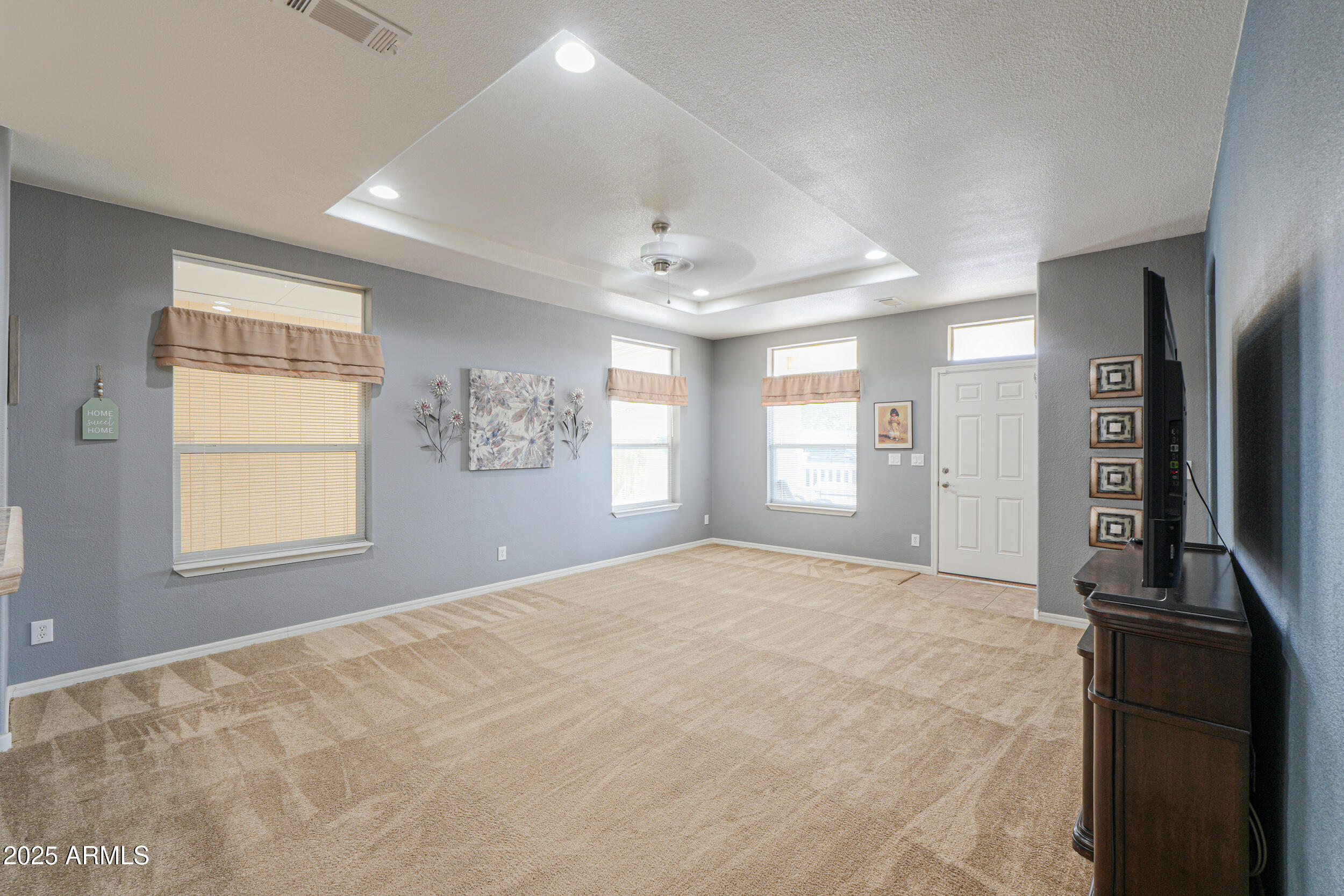 2263 North Trekell Road, Unit 36 Casa Grande, AZ 85122 - Photo 8 of 53 a view of an empty room with a window