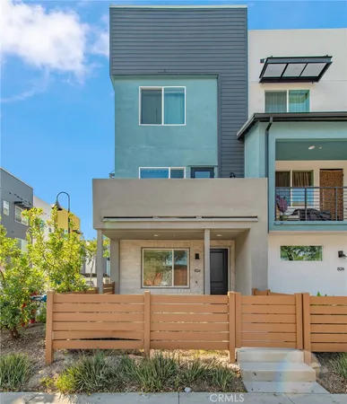 a view of a house with brick walls