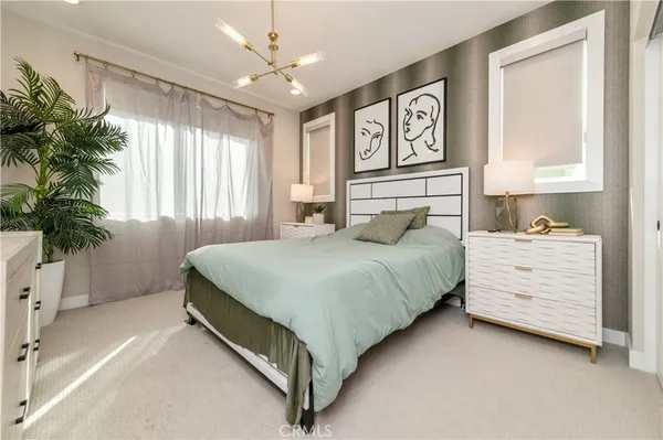 a view of cabinets with stainless steel appliances wooden cabinet and entryway