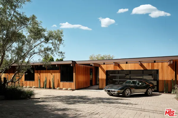 a car parked in front of a house