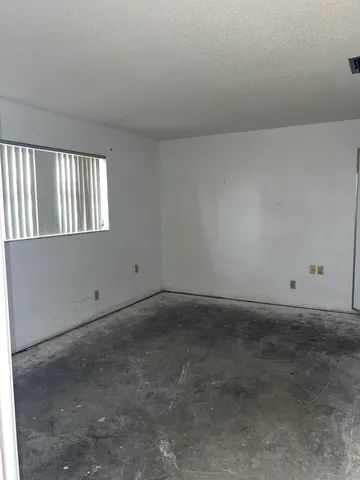 an empty room with a window