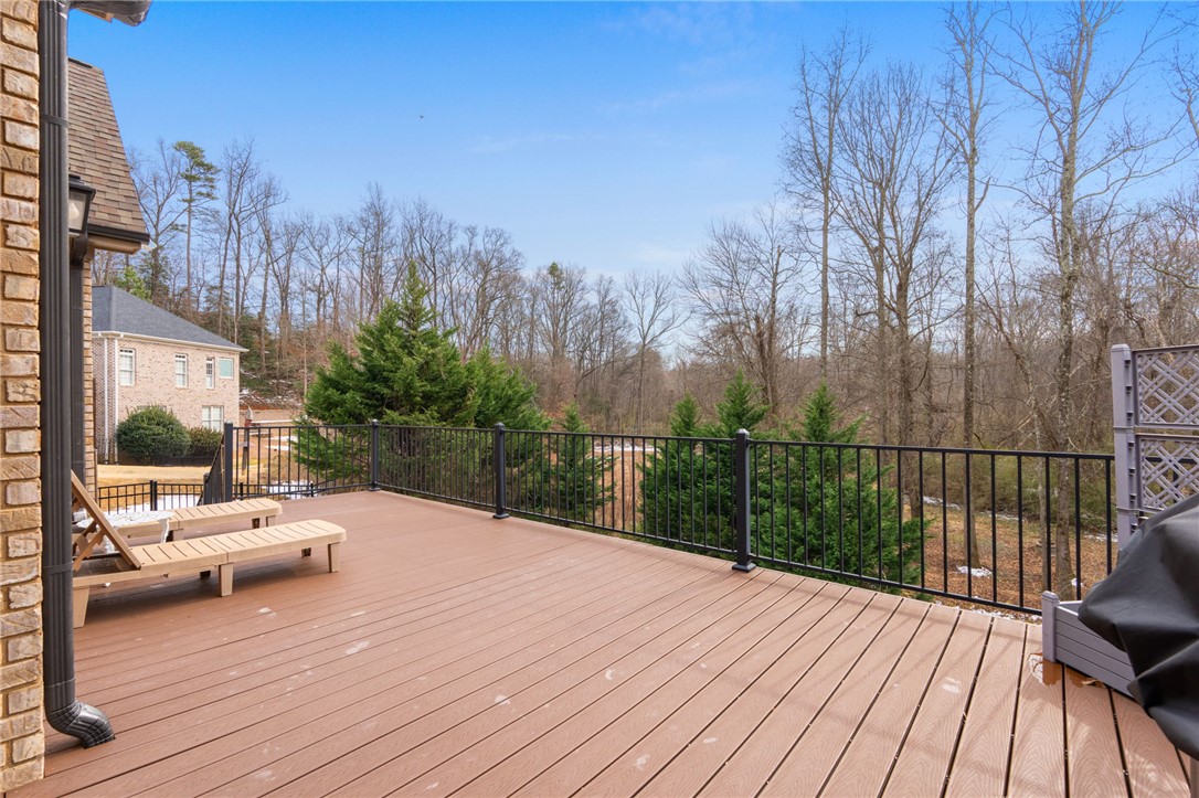 10 Colonel Storrs Court Greer, SC 29650 - Photo 34 of 48 An inviting deck extends from the home, offering serene views of the surrounding natural landscape.