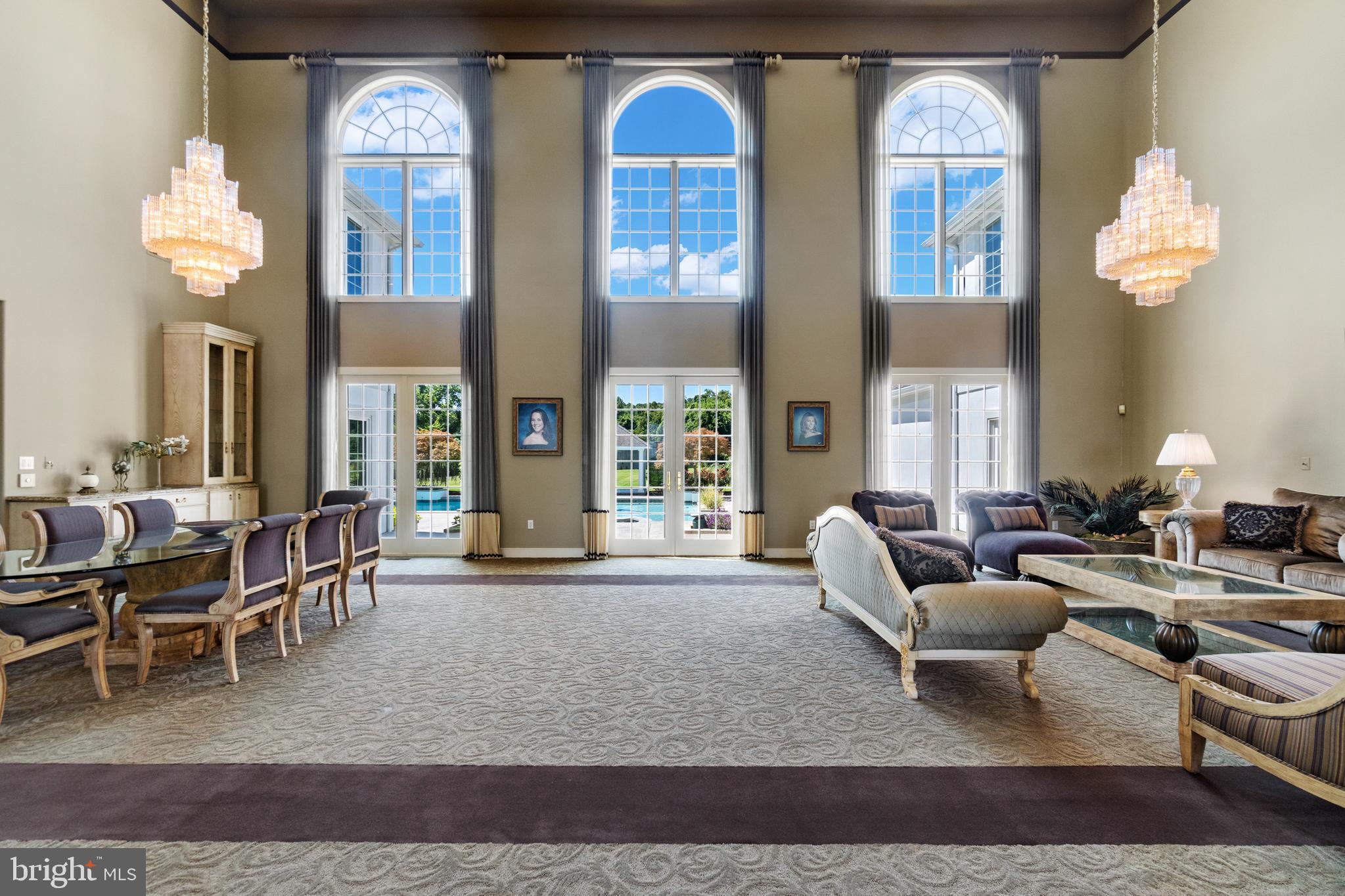 607 Friendship Road North Beach, MD 20714 - Photo 12 of 79 Great room floor to ceiling windows