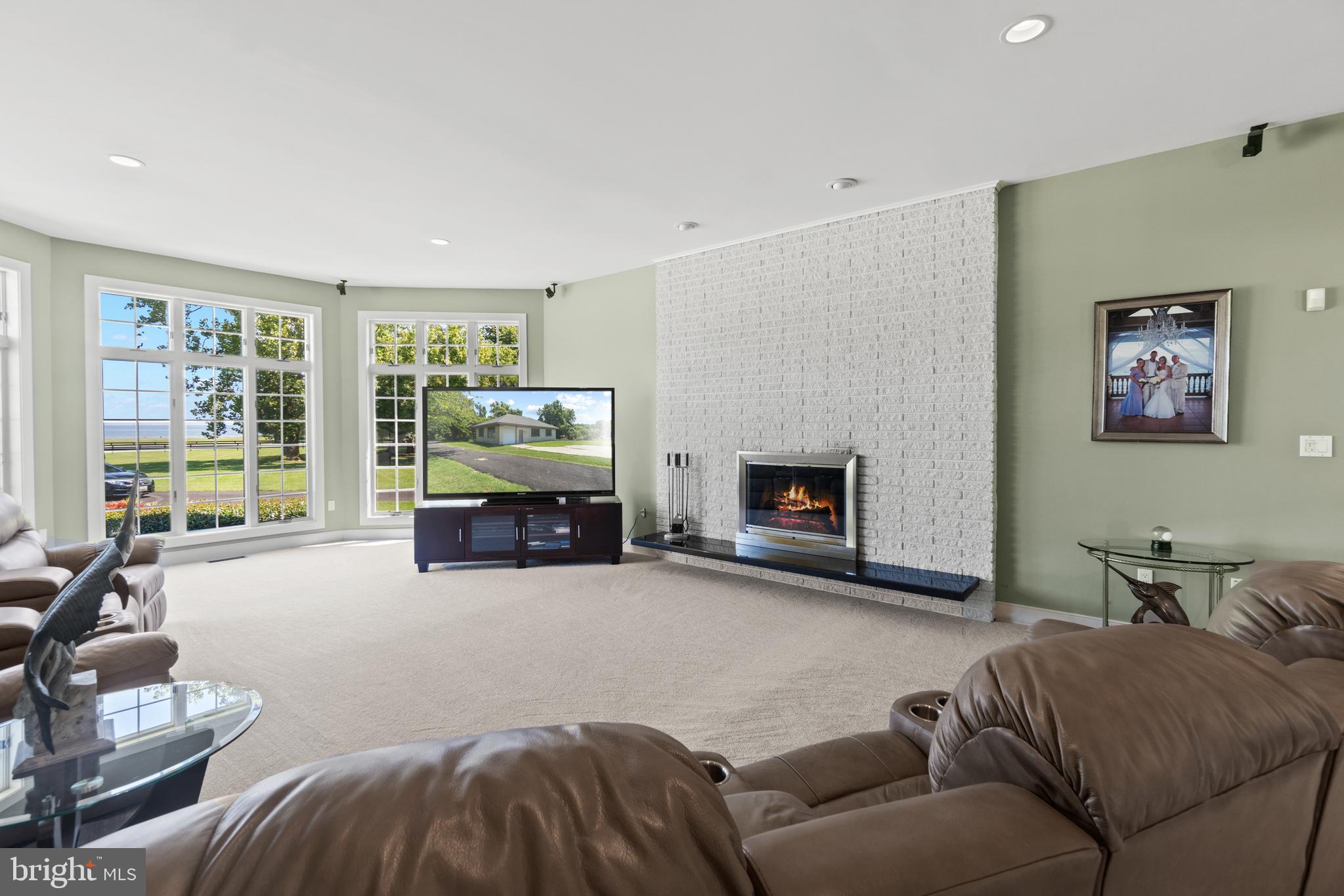 607 Friendship Road North Beach, MD 20714 - Photo 18 of 79 Family room with expansive Bay views