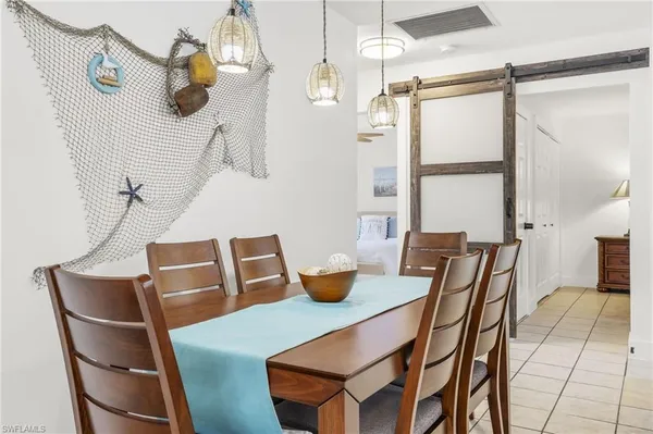 a bed room with a bed and a night stand