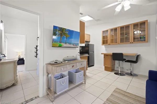 a kitchen with stainless steel appliances a stove a sink and a refrigerator