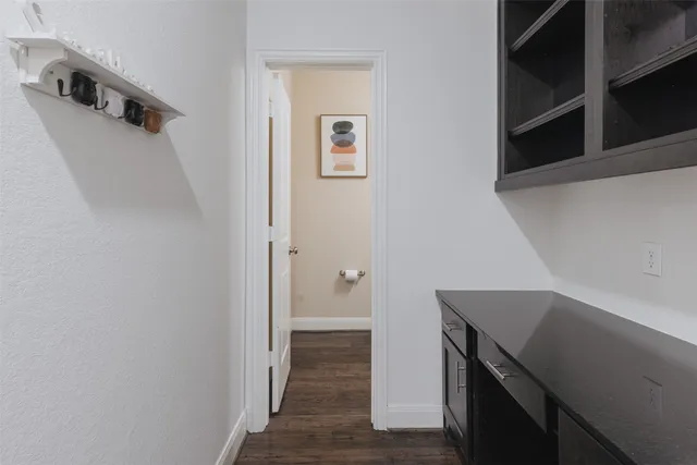 a view of a hallway with storage