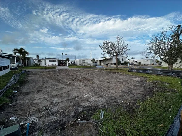 a view of a town with barn house