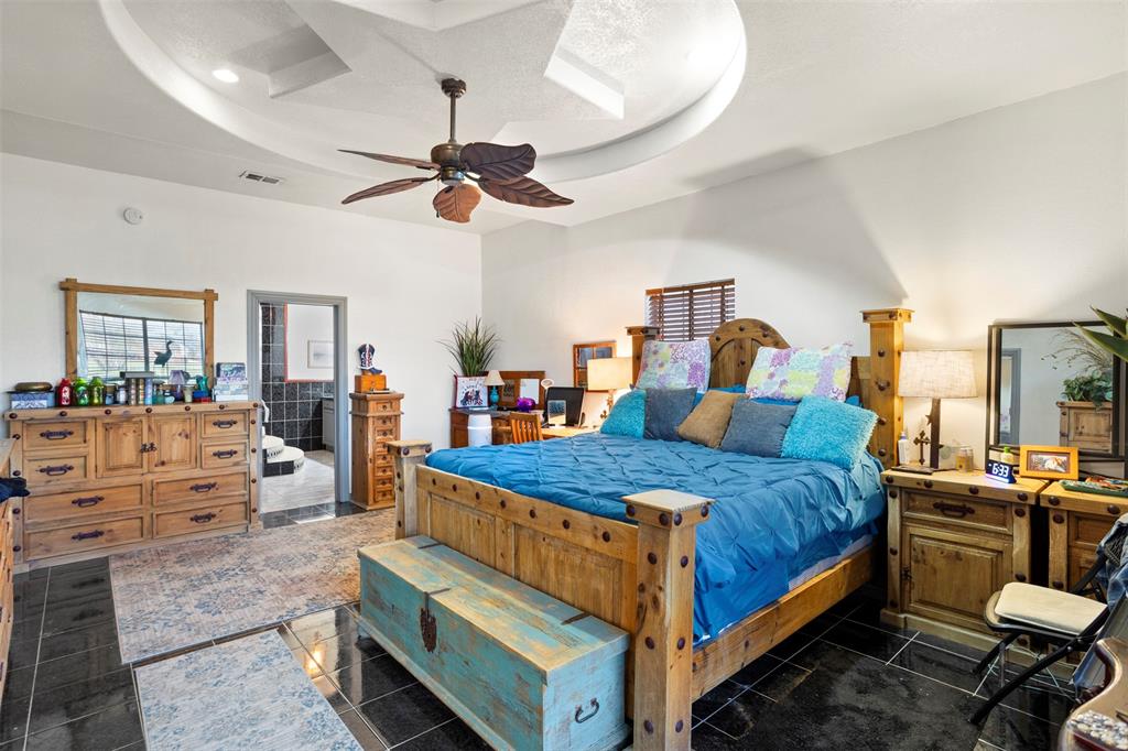 6524 Fair Road Kaufman, TX 75142 - Photo 15 of 30 a bed room with bed and window