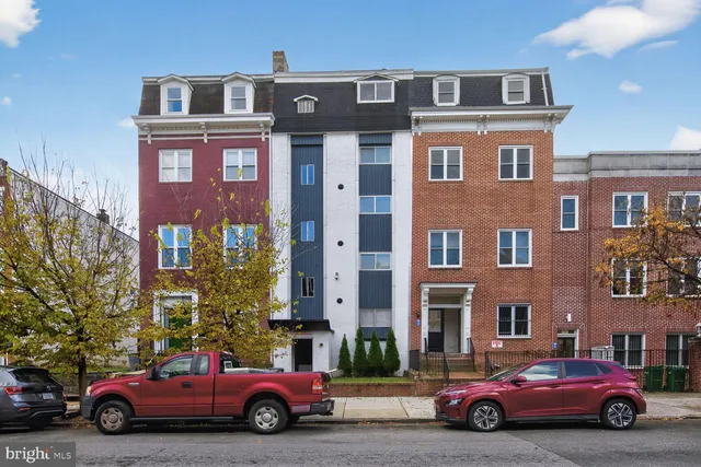 a car parked in front of a building