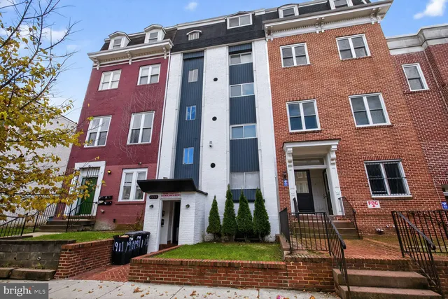 a view of a building with pathway