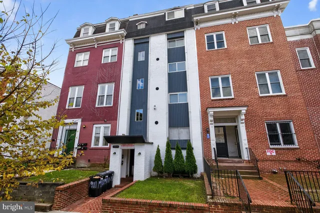 a car parked in front of a building