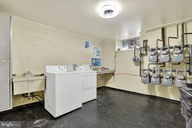 a utility room with cabinets