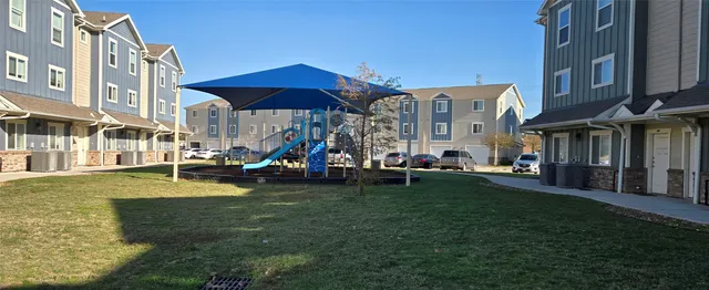 a cars parked in front of a building