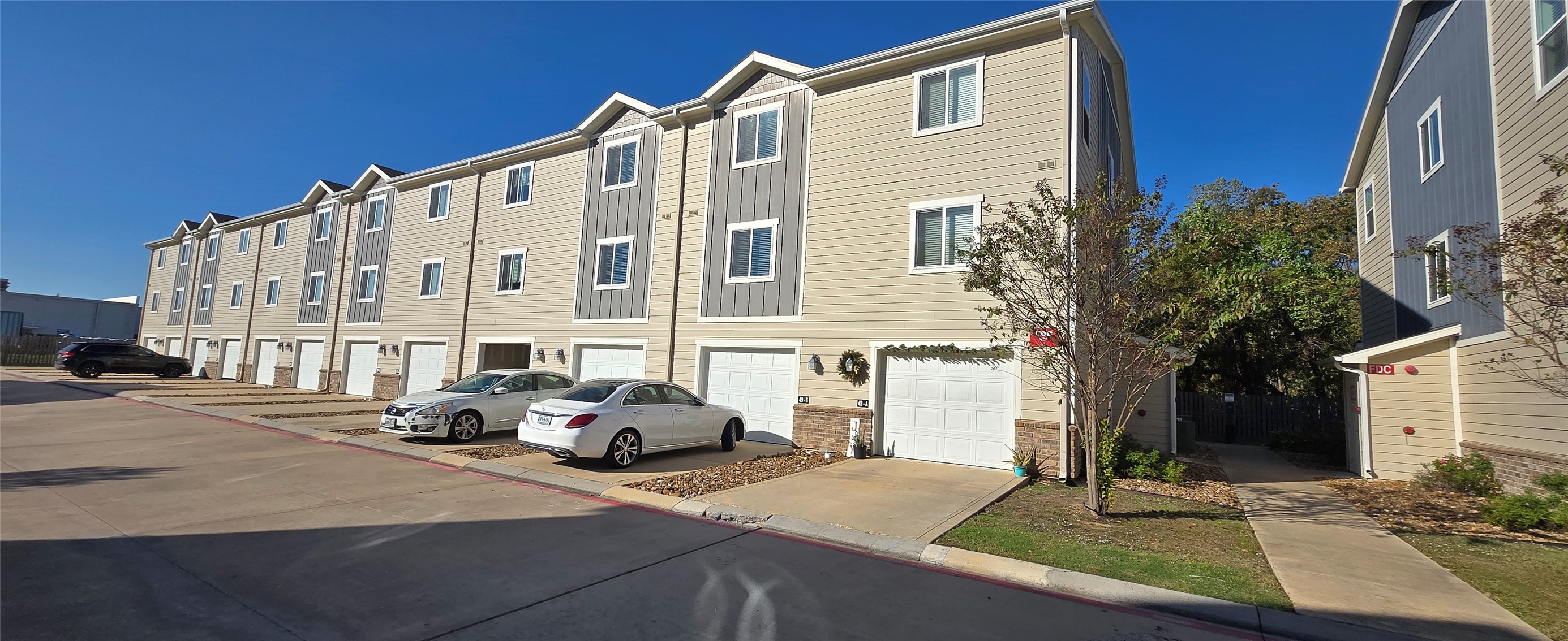 21155 Gosling Road, Unit 49 Spring, TX 77388 - Photo 2 of 11 a cars parked in front of a building