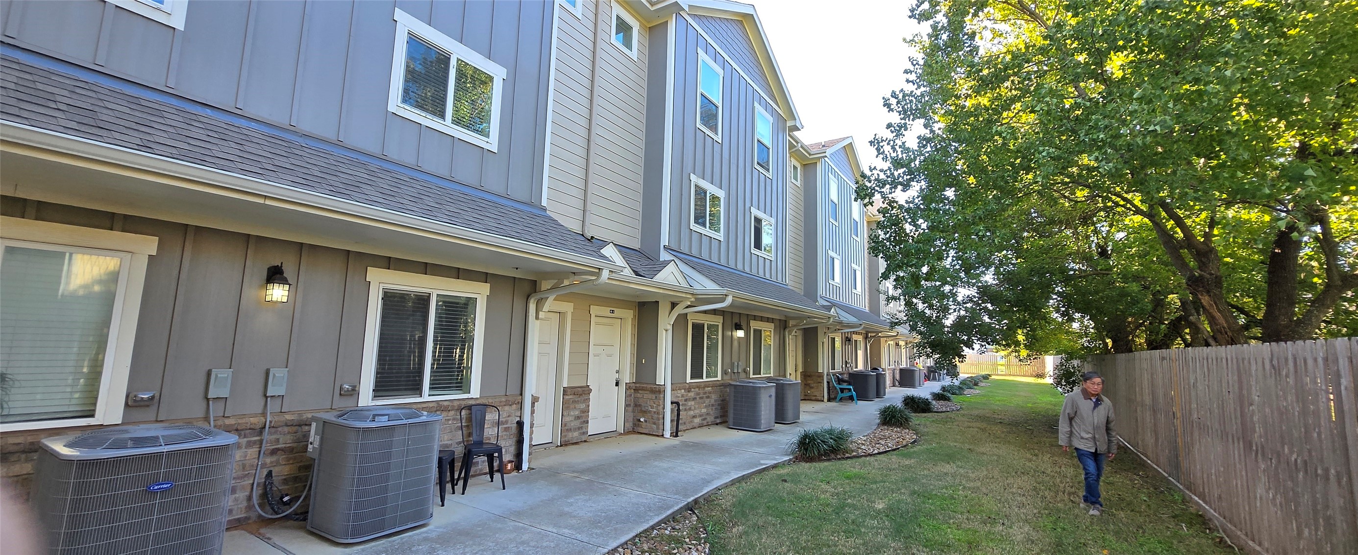 21155 Gosling Road, Unit 49 Spring, TX 77388 - Photo 3 of 11 a view of a house with backyard and sitting area