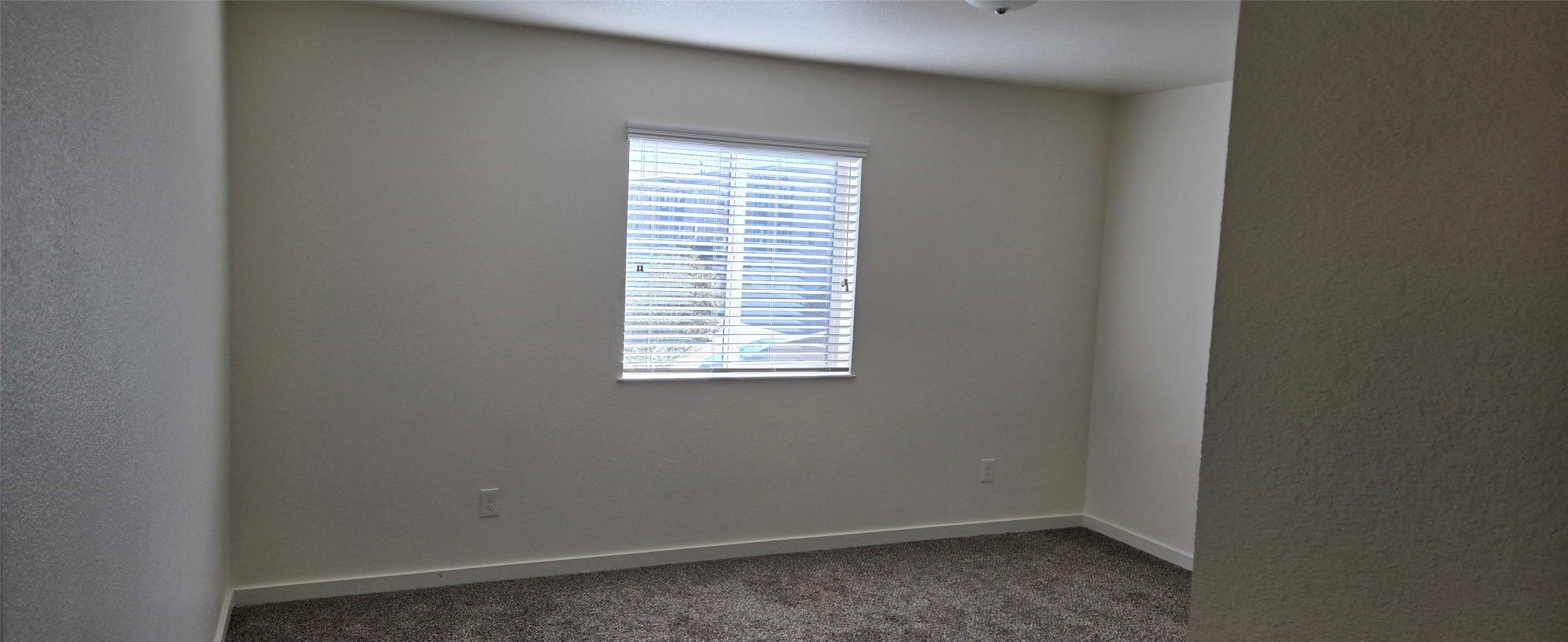 21155 Gosling Road, Unit 49 Spring, TX 77388 - Photo 9 of 11 an empty room with a window