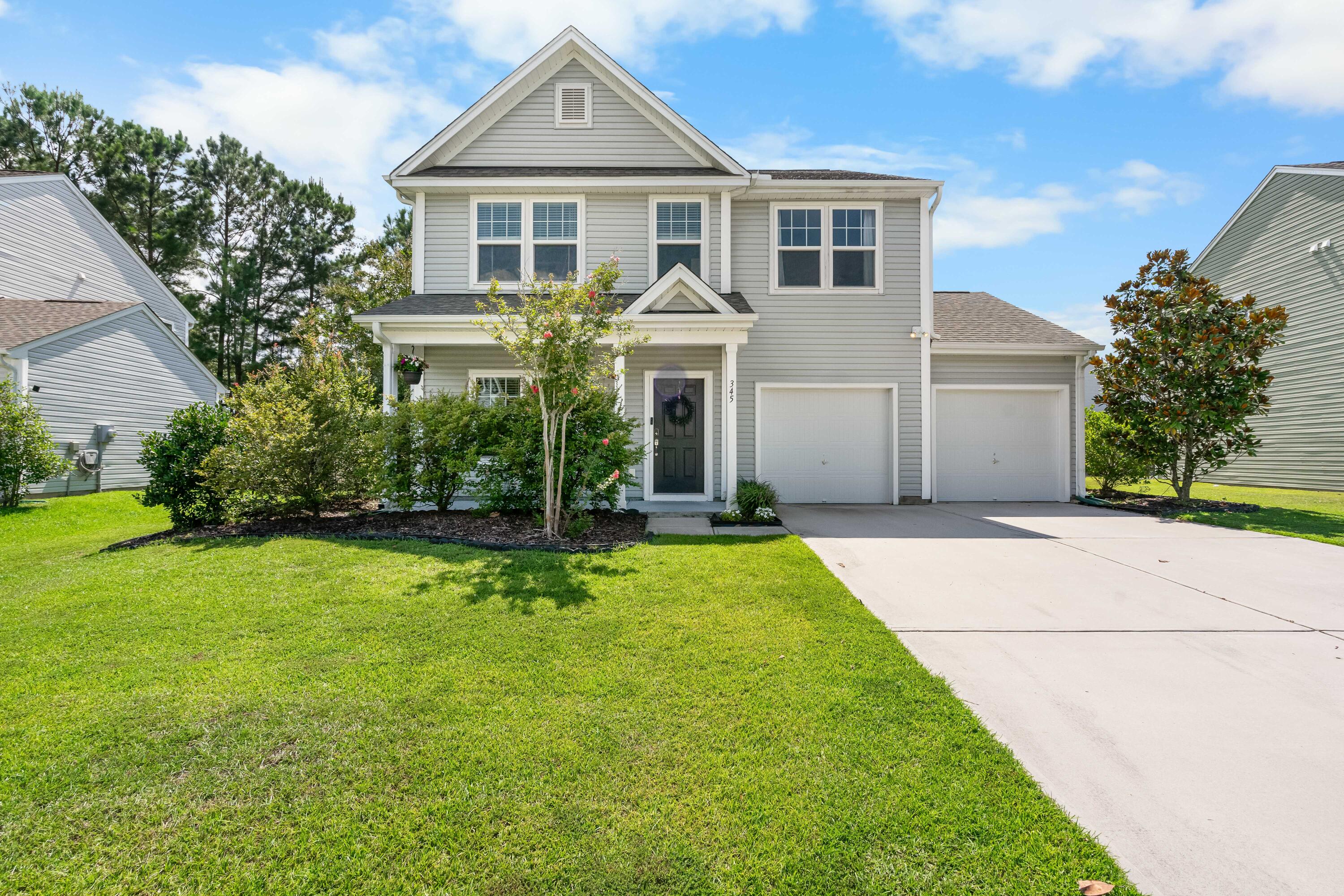 345 Garbar Lane Moncks Corner, SC 29461 - Photo 4 of 54 Front from Sidewalk