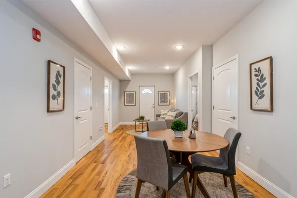 a view of a dining room with furniture
