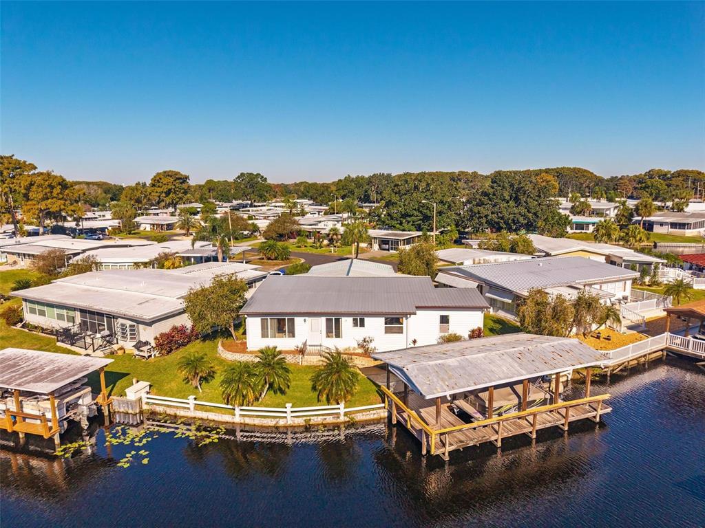 945 Todd Way Tavares, FL 32778 - Photo 56 of 75 a view of a city with an ocean view