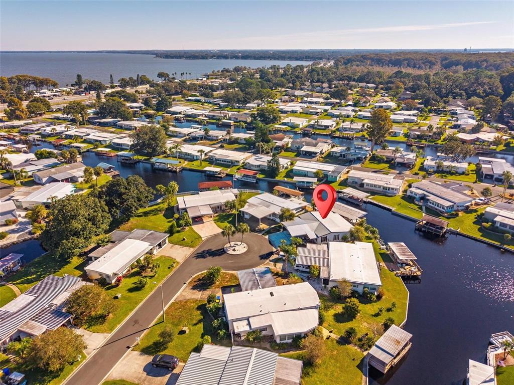 945 Todd Way Tavares, FL 32778 - Photo 63 of 75 an aerial view of a city with lots of residential buildings