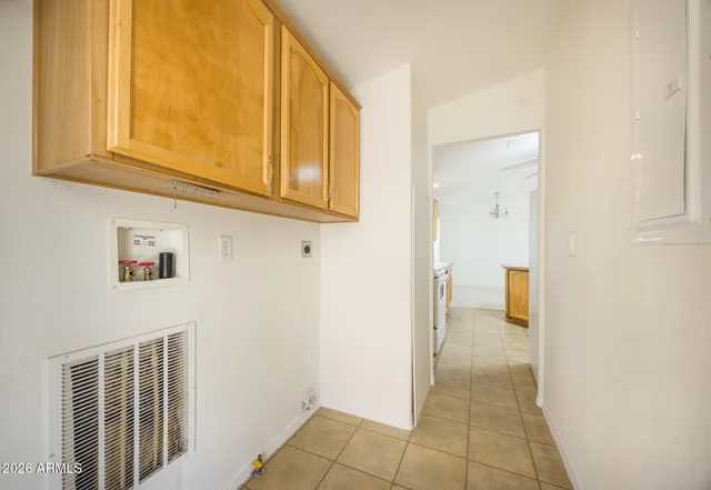 a view of a hallway with a bathroom