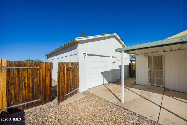 a view of a back yard of the house