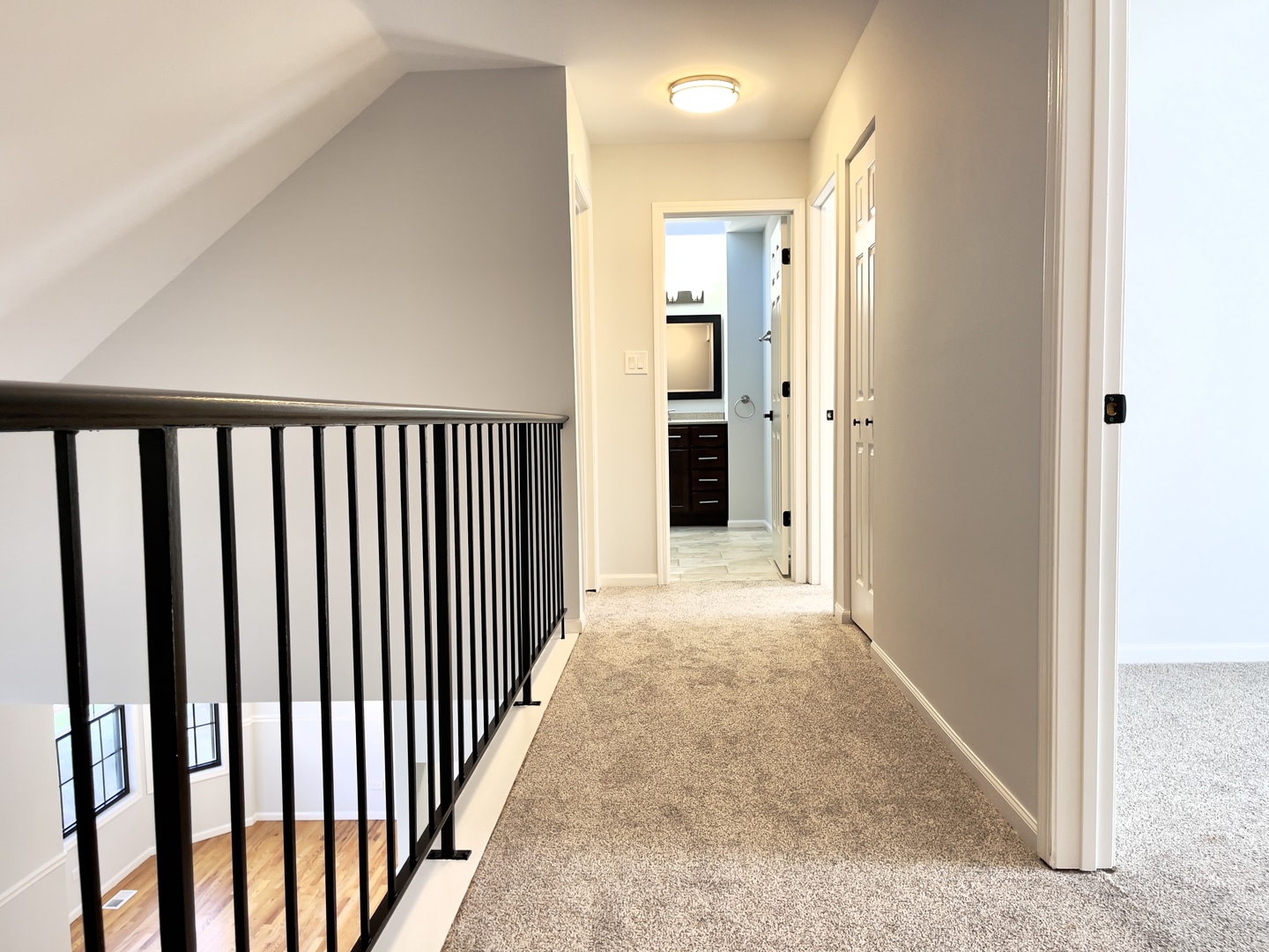 4480 Opal Drive Hoffman Estates, IL 60192 - Photo 12 of 18 a view of a hallway with wooden floor