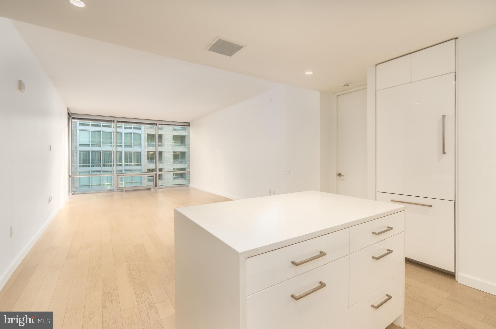 1110 23rd Street Northwest, Unit 505 Washington, DC 20037 - Photo 6 of 25 a view of cabinet and window