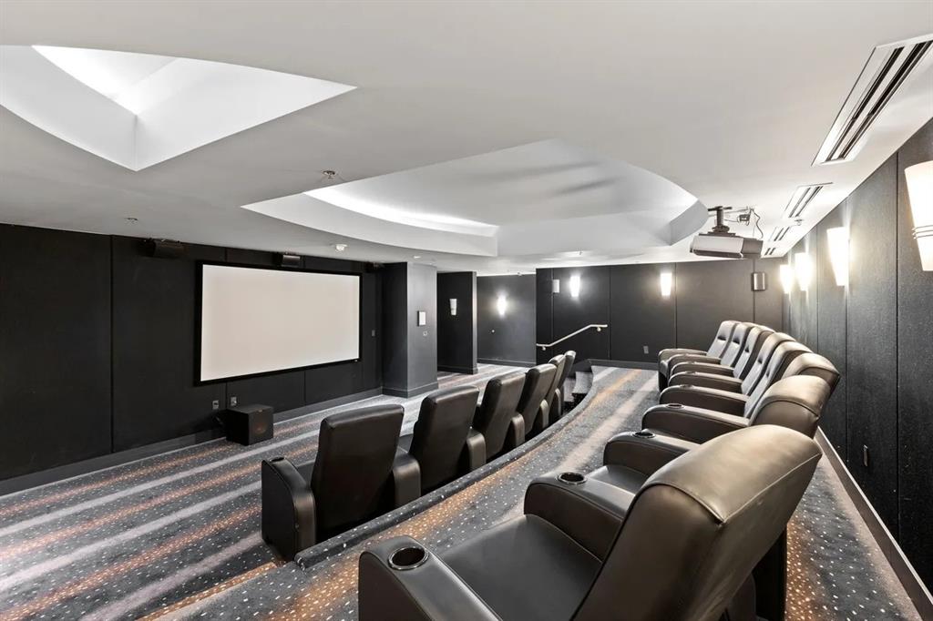 1200 Main Street, Unit 902 Dallas, TX 75202 - Photo 6 of 13 a projector room with chairs and projector