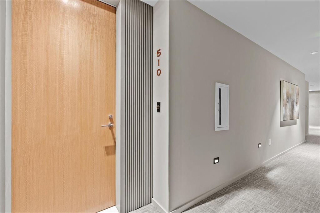 1020 Sunset Point Road, Unit 510 Clearwater, FL 33755 - Photo 7 of 44 a view of a hallway with closet area